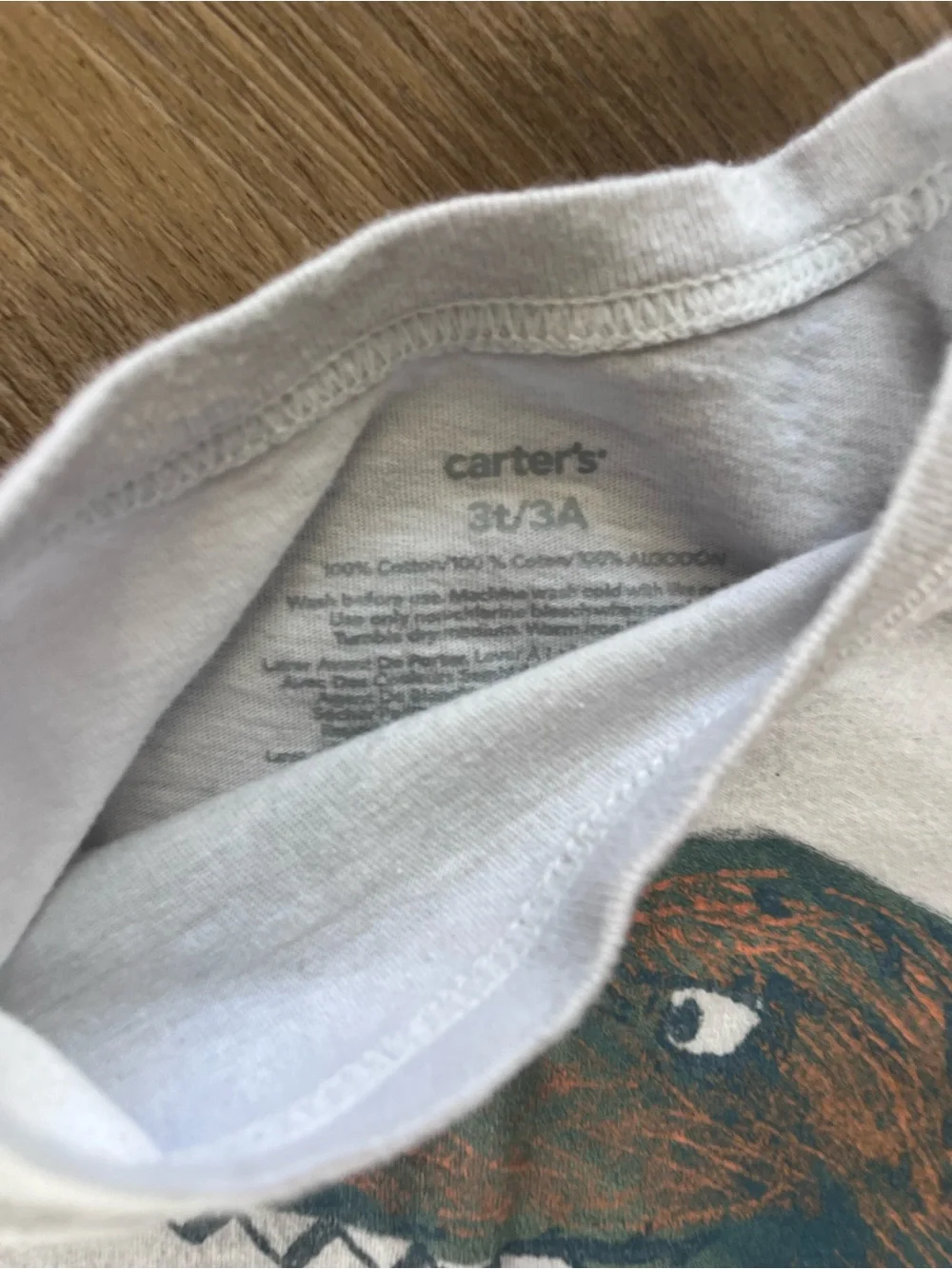Carter's White Tee with Green & Brown Dinosaur Print